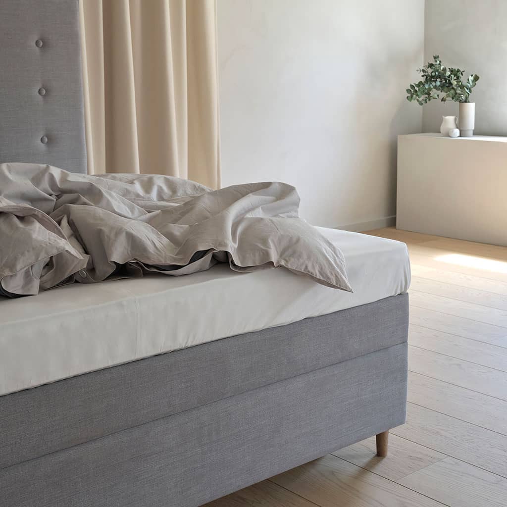 Le matelas habillé de son revêtement